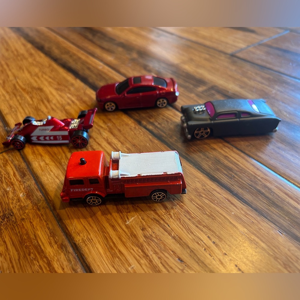 4 Maisto cars. 2011 dodge charger RT, Denver Pumper, Leadfoot & Turbo 15. Used.